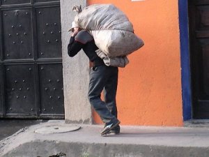 guatemalan-man-carrying-bag